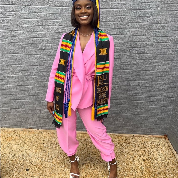 Two piece suit that comes with belt and ankle ties to produce the flared look - Picture 2 of 3